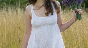 Susann Busty Brunette On The Meadow