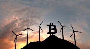 Bitcoinzeichen umgebend von Windkraftanlagen